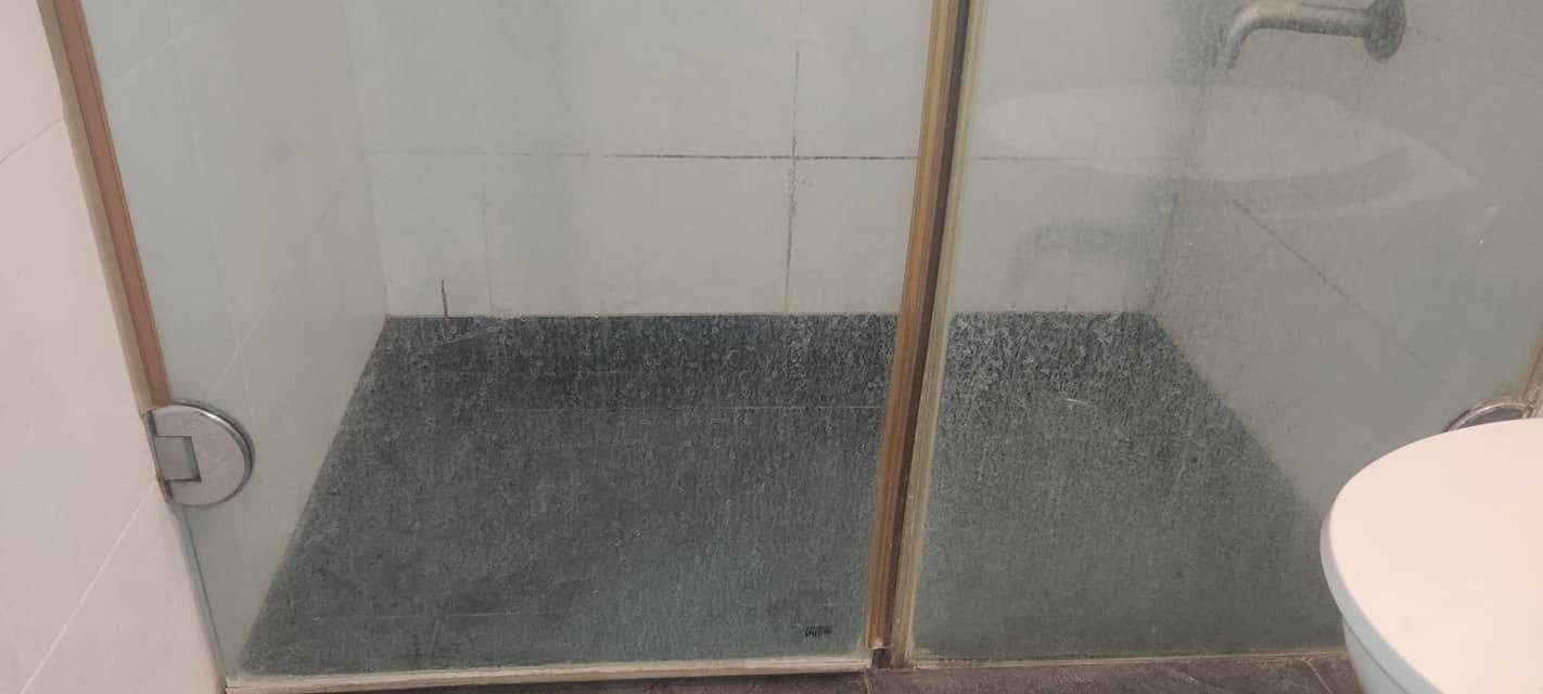 Shower tray and screen — before cleaning