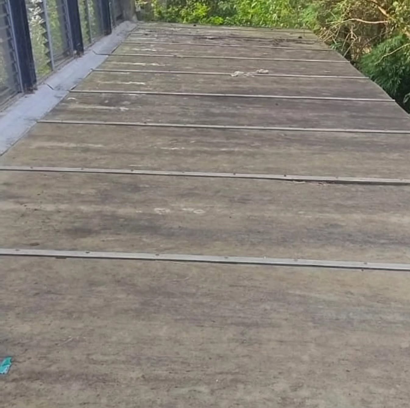 Covered verandah, scrubbed clean — before cleaning