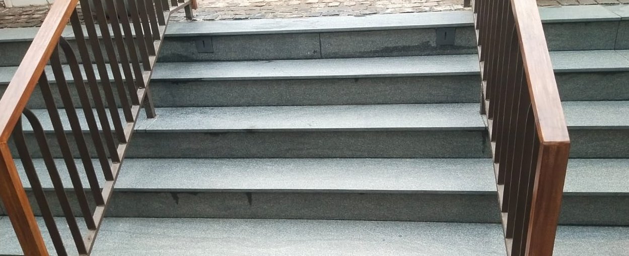 Granite steps, cement haze removed — after cleaning by Filth Fighters