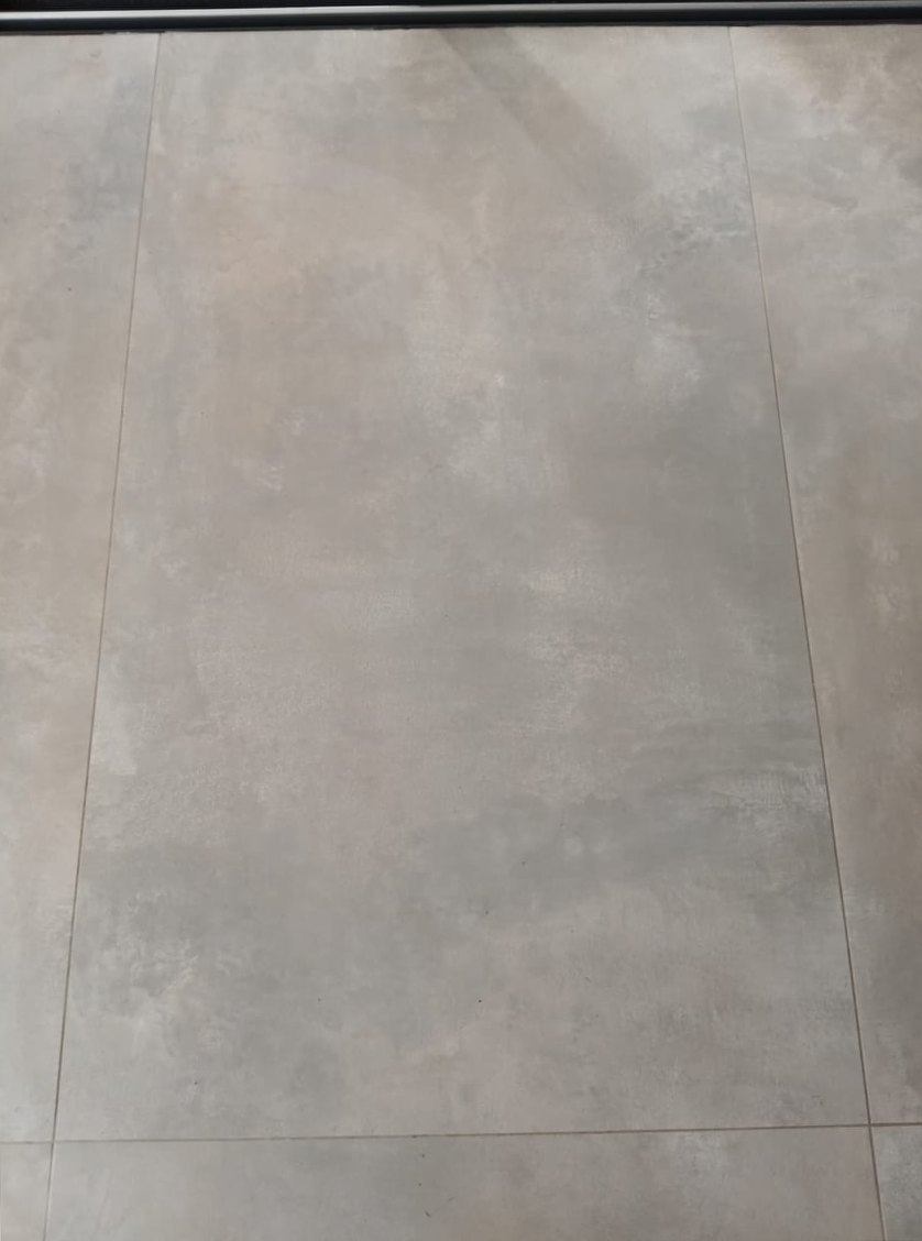 Rust marks off large-format tile — after cleaning by Filth Fighters