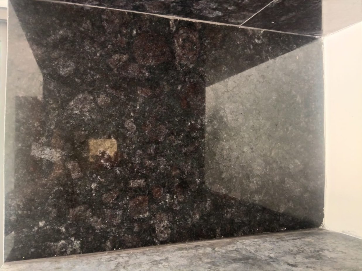 Granite, cement splatter removed — after cleaning by Filth Fighters