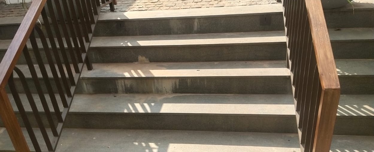 Granite steps, cement haze removed — before cleaning