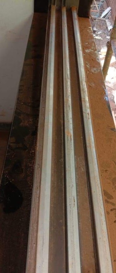 Sliding track, laterite dust cleared — before cleaning